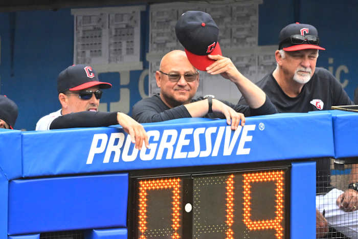 Jun 11, 2023; Cleveland, Ohio, USA; Cleveland Guardians third base coach Mike Sarbaugh (16), manager Terry Francona (77) and pitching coach Carl Willis (51) watch from the dugout in the seventh inning against the Houston Astros at Progressive Field. Mandatory Credit: David Richard-USA TODAY Sports